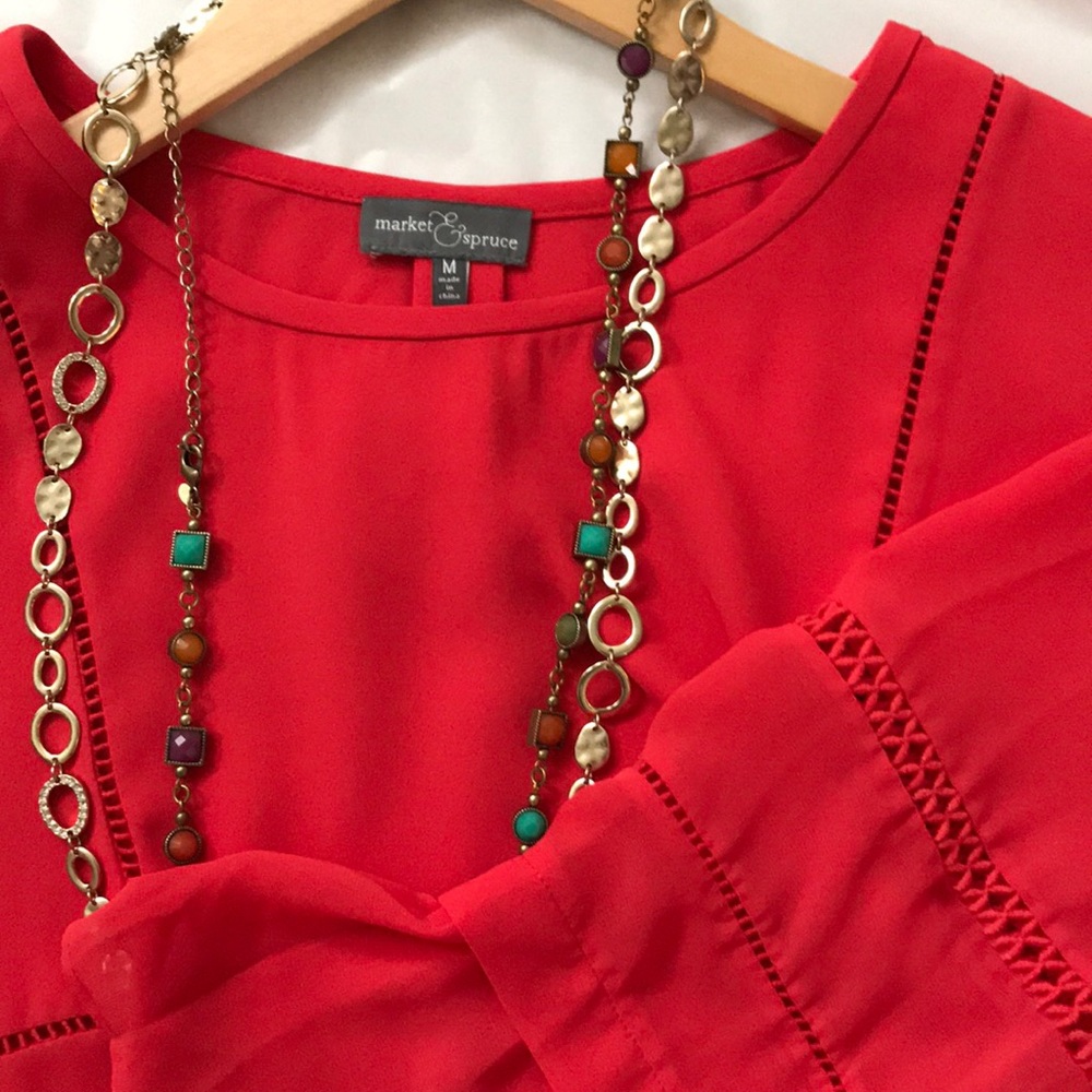 Bell sleeved blouse with crochet type detail